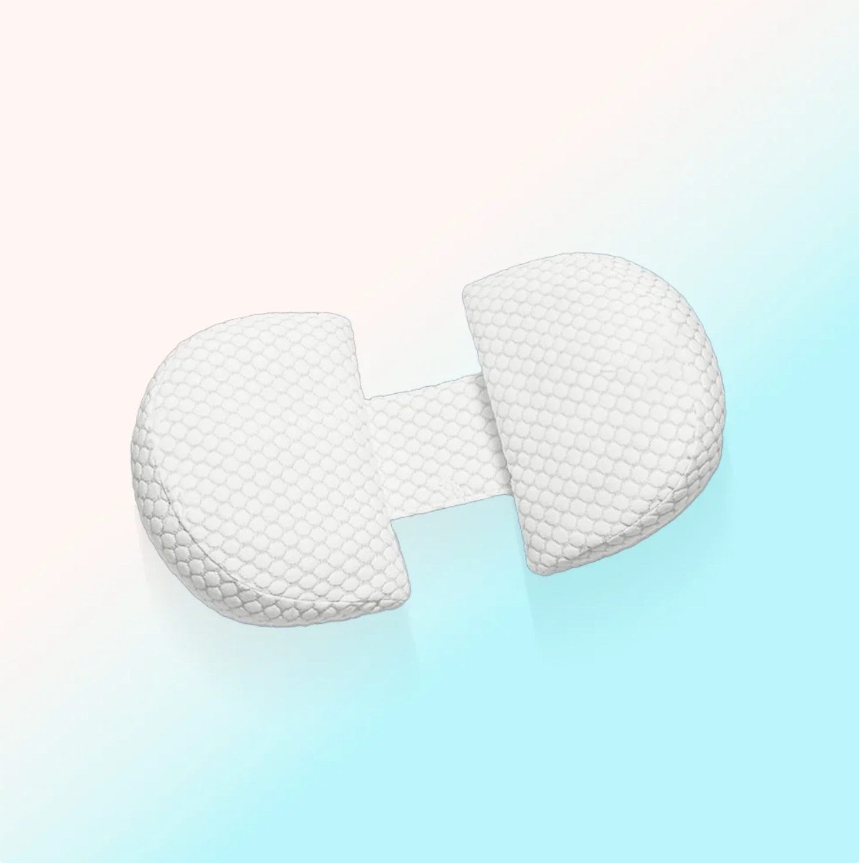 Coussin de grossesse Be'Plume blanc, ergonomique et compact, offrant un maintien optimal du ventre et du dos pendant la grossesse.